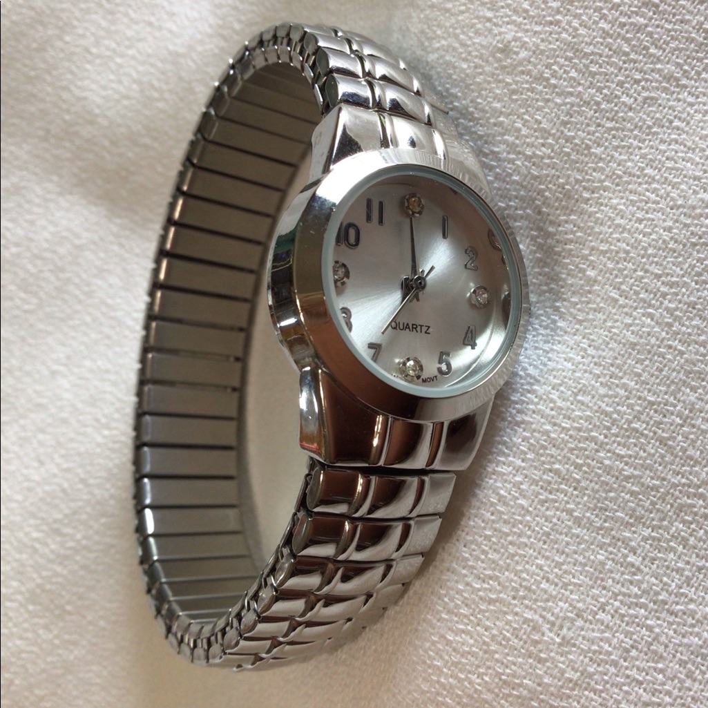 Stretch Bracelet Style Watch In Silver Tone